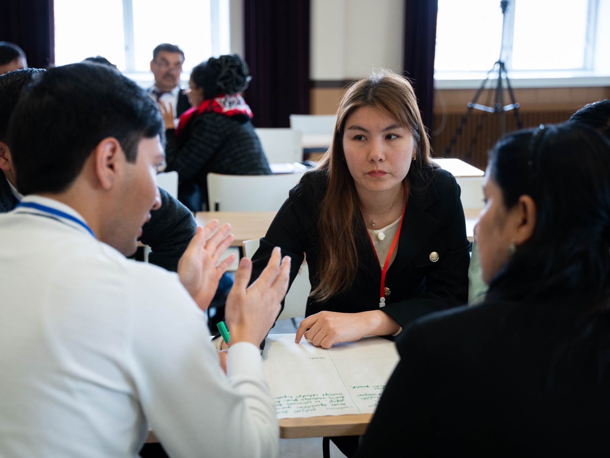 Educators discussing together in a small group